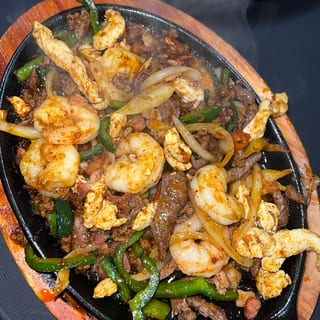 3 Amigos Fajitas ( Chicken, Steak, Shrimp)